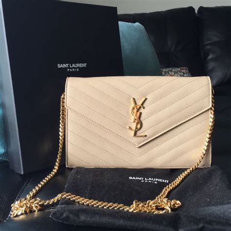 ysl purse cream|saint laurent bag with tassel.